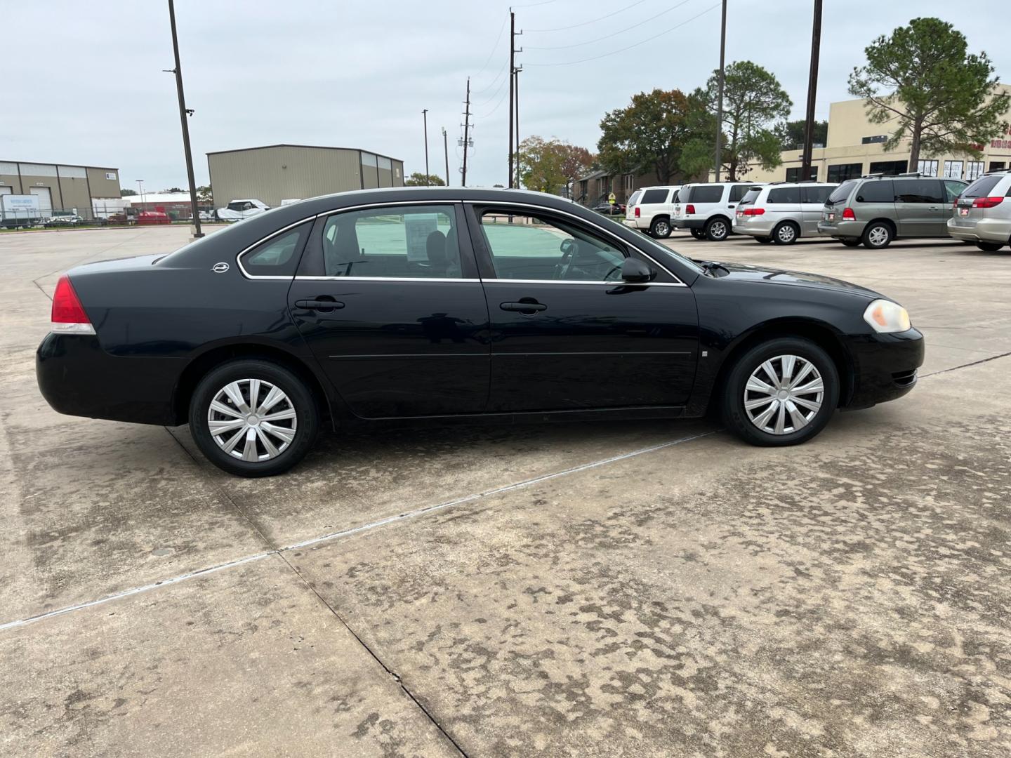 2008 Black /gray Chevrolet Impala LS (2G1WB55K381) with an 3.5L V6 OHV 16V FFV engine, 4-Speed Automatic Overdrive transmission, located at 14700 Tomball Parkway 249, Houston, TX, 77086, (281) 444-2200, 29.928619, -95.504074 - Photo#7